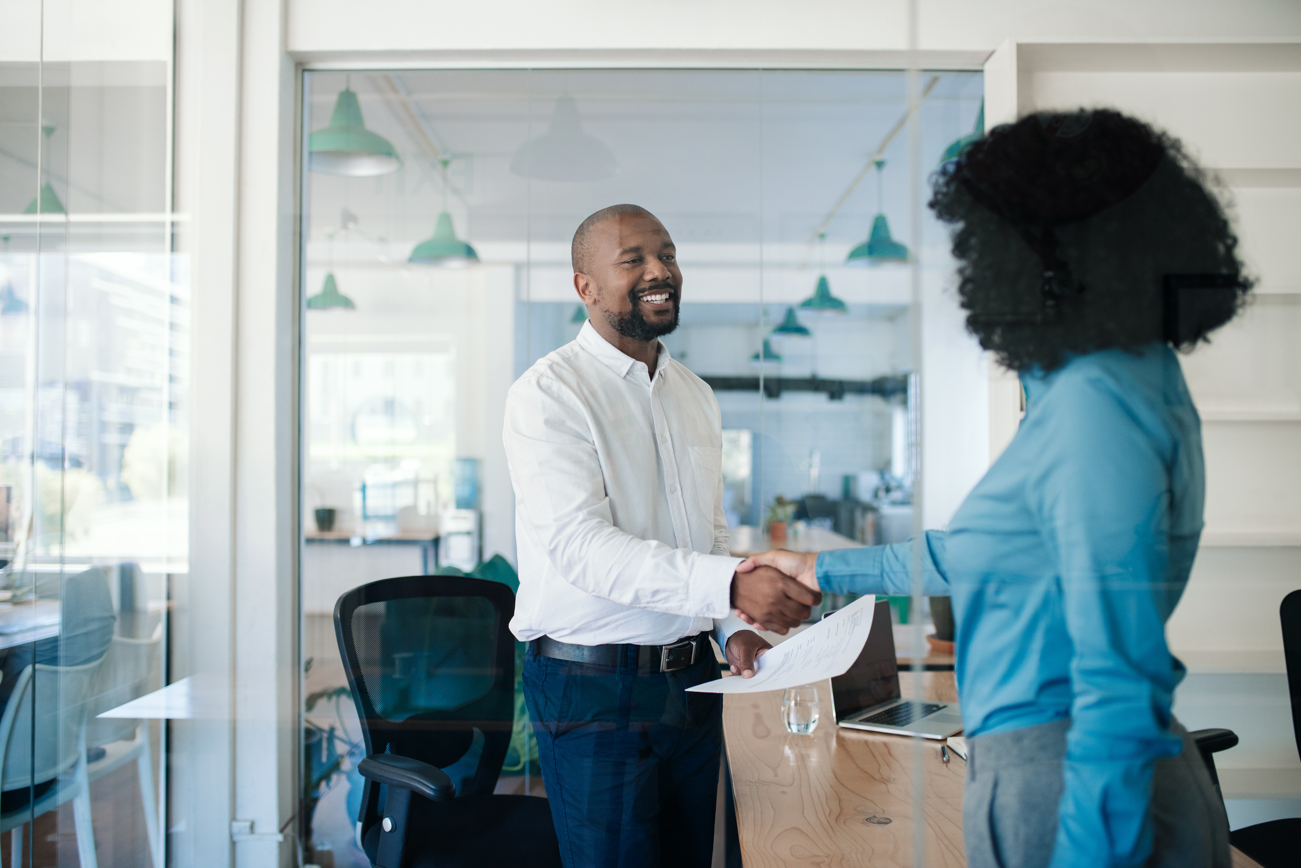 Professional conversation and handshake